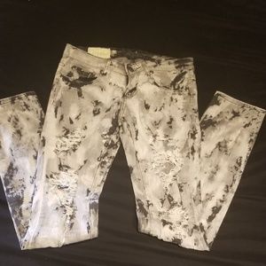 Distressed Machine Jeans